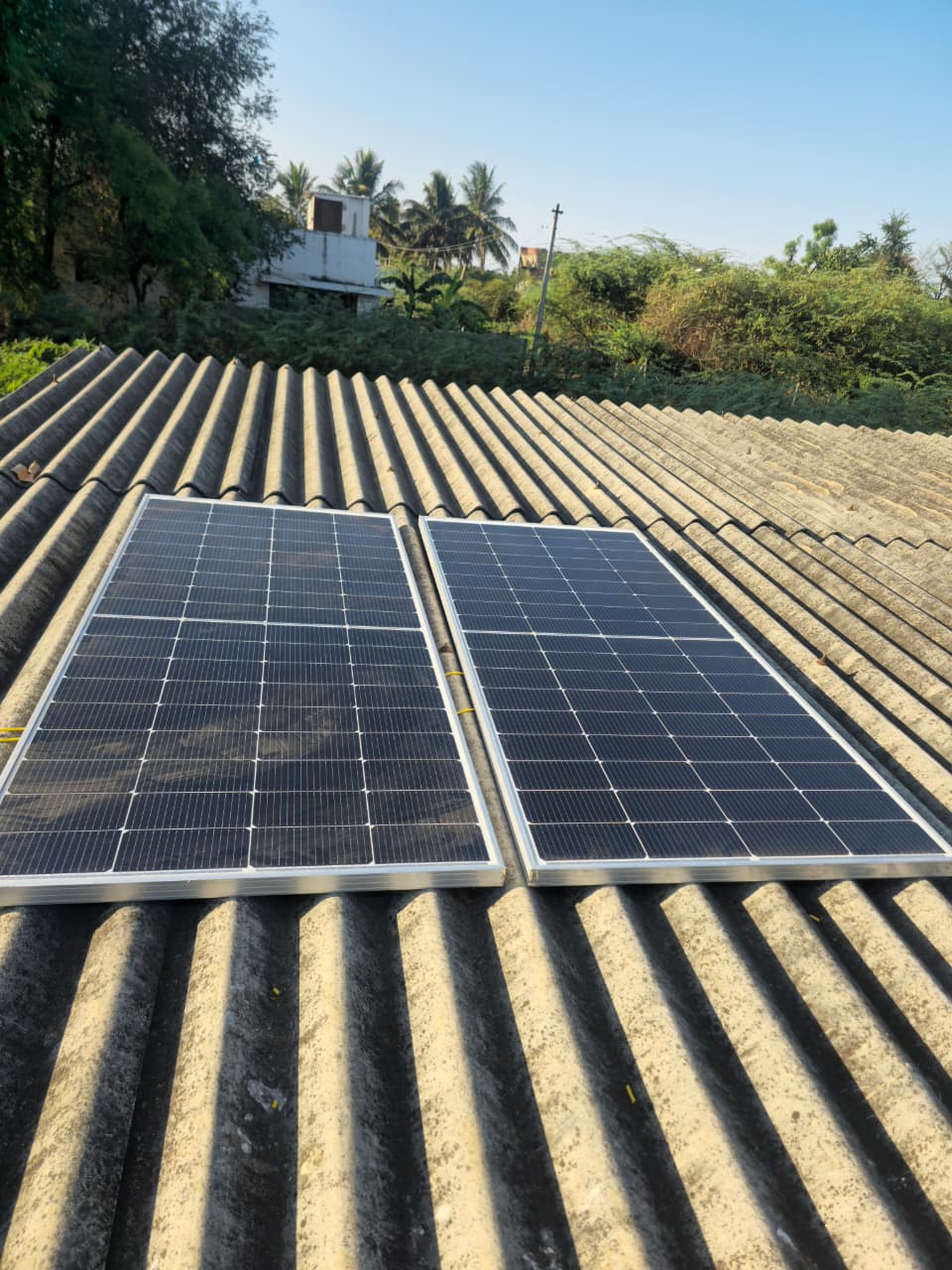 Solar panels installed on corrugated roof
