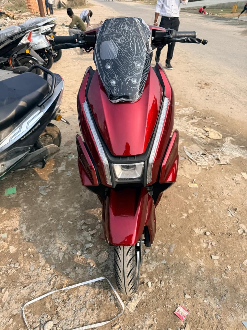 Red electric scooter front view