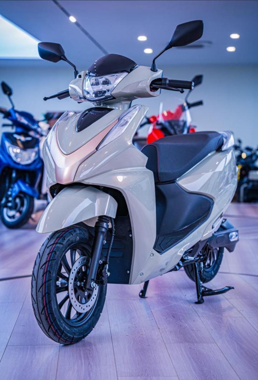 White electric scooter in showroom